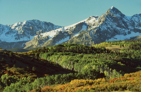 Sharp peaked mountain and foliage