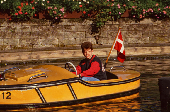 Boy on little boat
