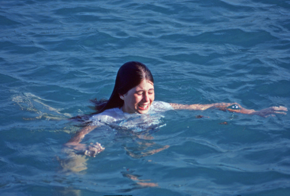 Young woman treading water