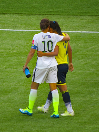 Carli Lloyd consoles Colombian player, Edmonton, Women's World Cup, 2015